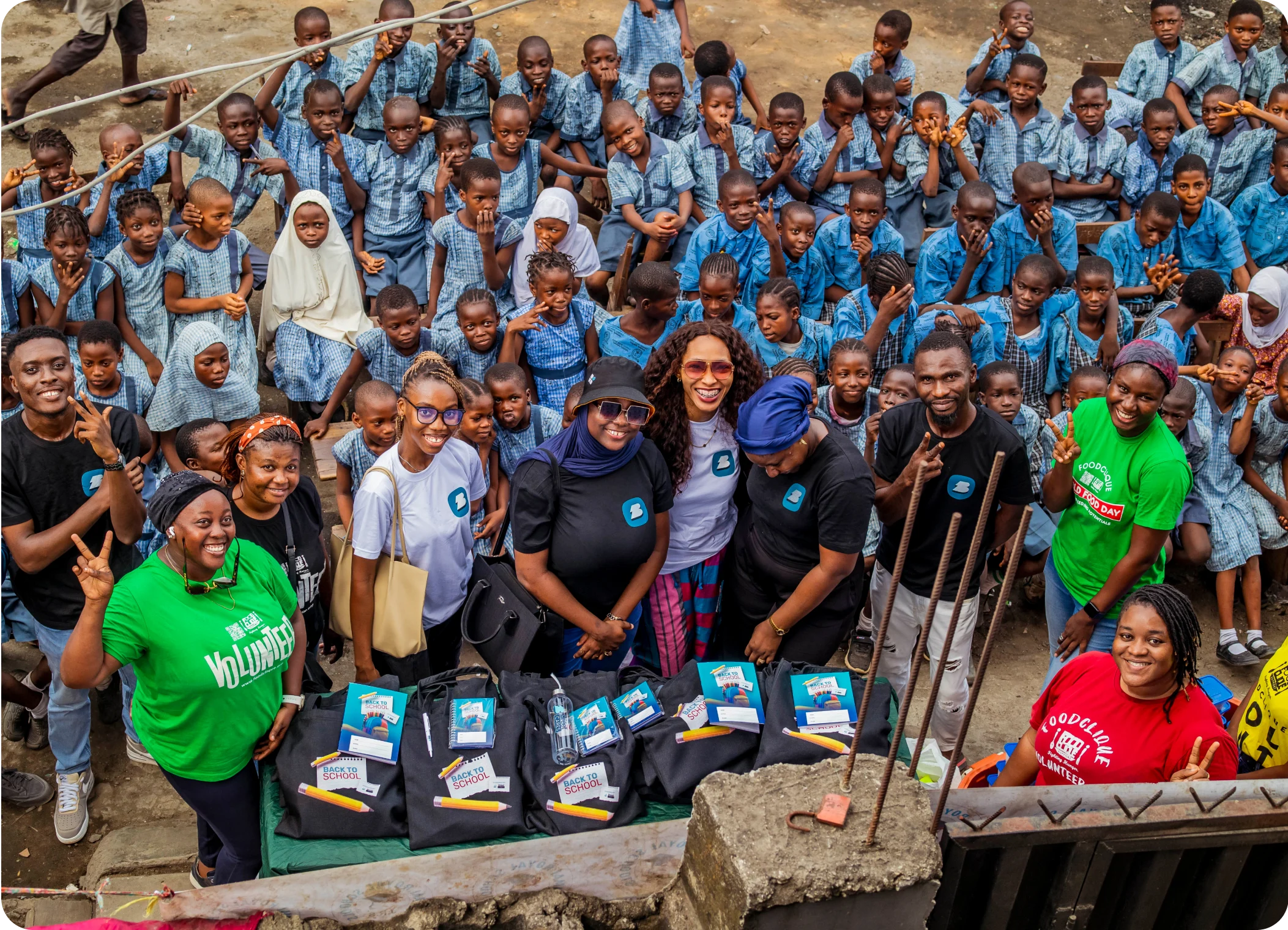 a group of people looking up and posing for a picture